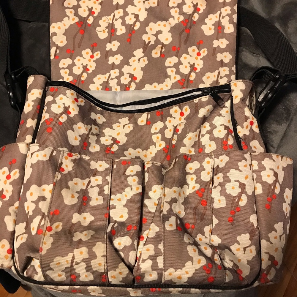 Skip -hop brown bag with cup holders on the side